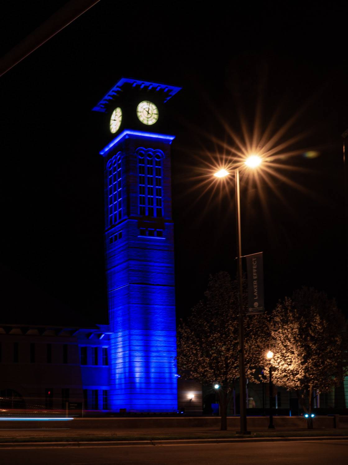 GVSU turns the Beckering Family Carillon Tower, on its Grand Rapids Campus, blue as a way to thank critical workers for their service during the COVID-19 pandemic